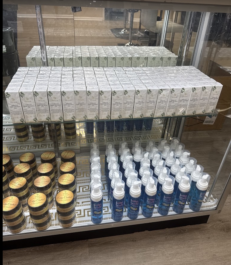 Hair growth oils and styling products available at Unique African Hair Braiding Salon