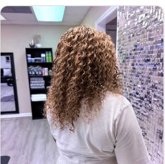 Curly crochet style at Unique